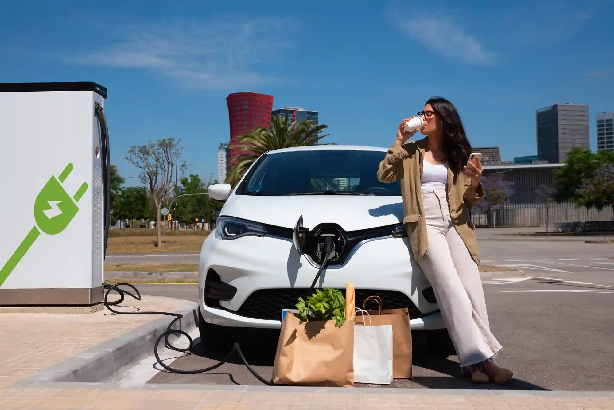 full-shot-woman-enjoying-coffee-near-car full-shot-woman-enjoying-coffee-near-car
